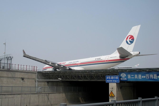 Beijing Capital International Airport Transfer: Airport (PEK) to Hotel Roundtrip - Is This a Group Ride or a Private Car?