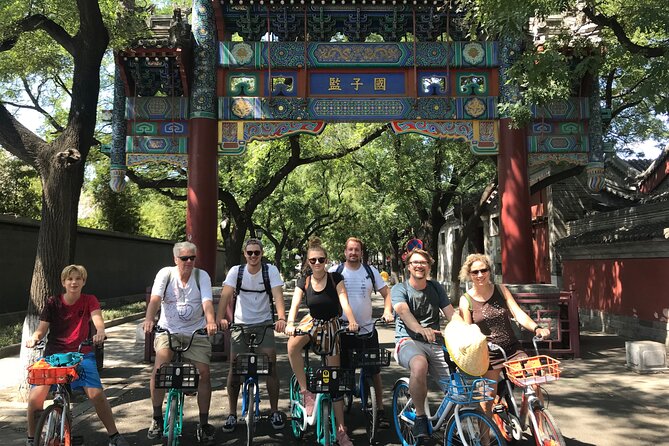 Beijing City Four-hour Bicycle Tour With a Private Guide - Drum and Bell Tower Square: Local Activities You Can Watch or Join