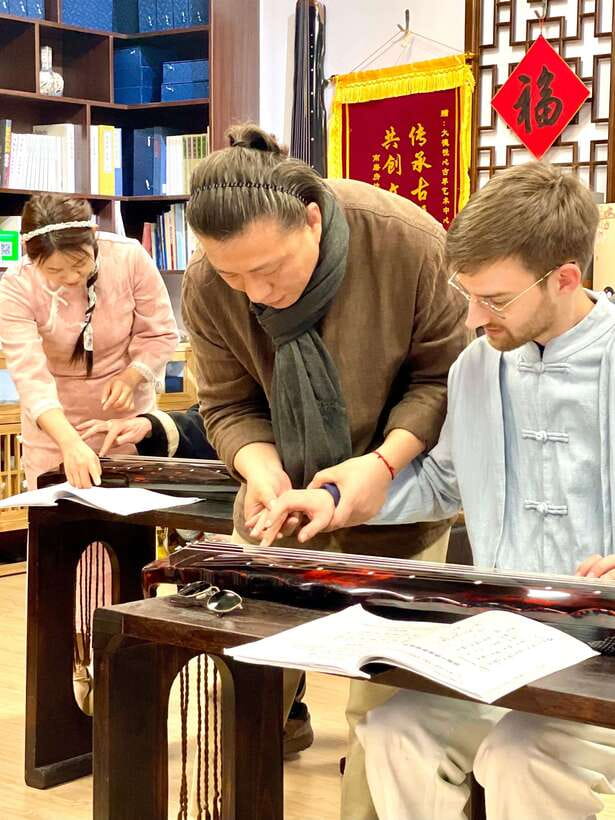 Beijing Hands-On Culture Tour: Tea, Instrument, Calligraphy - Guqin class: how you play a full ancient melody