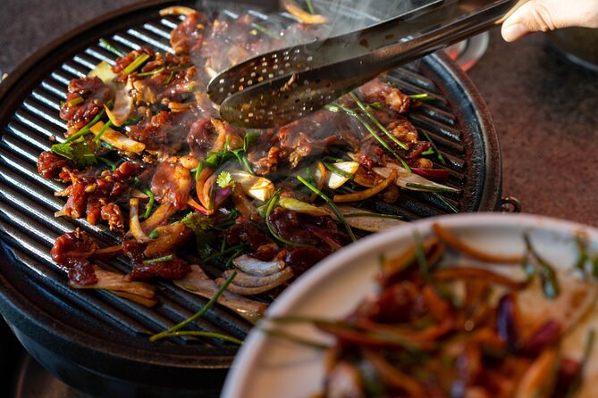 Beijing Hutong Walking Food and Beer Tour at Hidden Restaurants - Spring pancakes from a husband-wife kitchen for Chinese New Year flavor