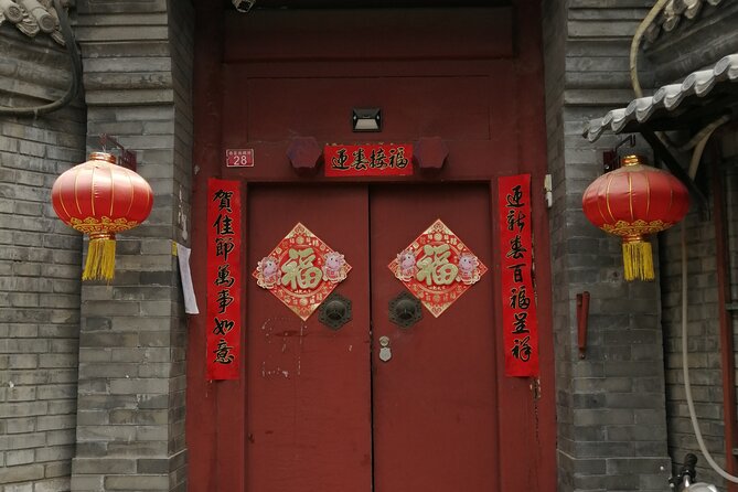 Beijing Hutongs Walking Tour - Nanluoguxiang Lane: grey courtyard walls and old-tree atmosphere