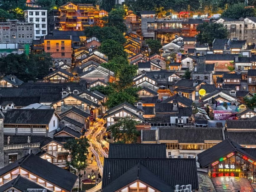 Chongqing: Private Food Tour and Magical Night Views - Pan-fried mini buns: the crisp, juicy surprise bite