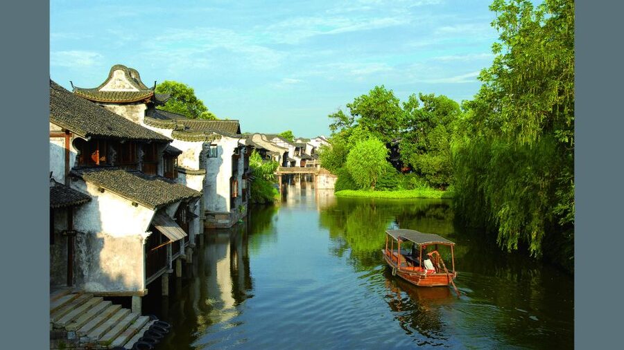 Delve into Wuzhen Water Town: Private Tour from Shanghai - Private guide quality, and why the English level matters