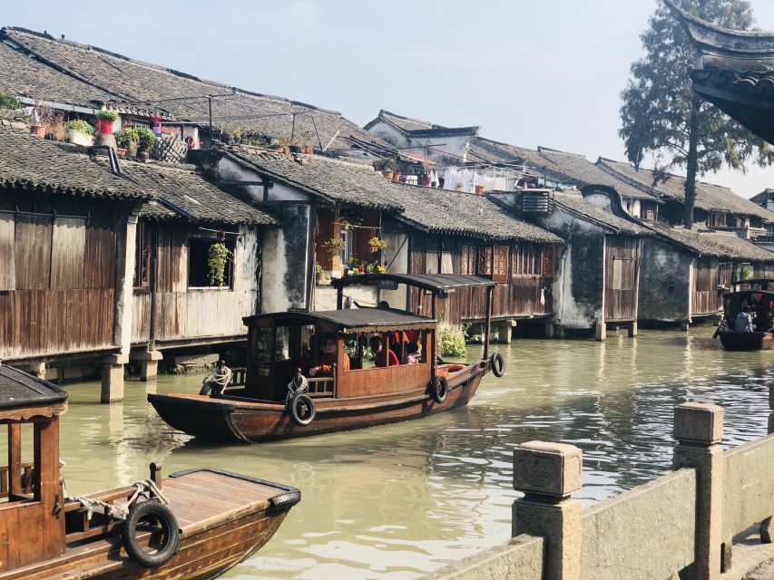 Delve into Wuzhen Water Town: Private Tour from Shanghai - Walking the old town through Dong Zha and Xi Zha