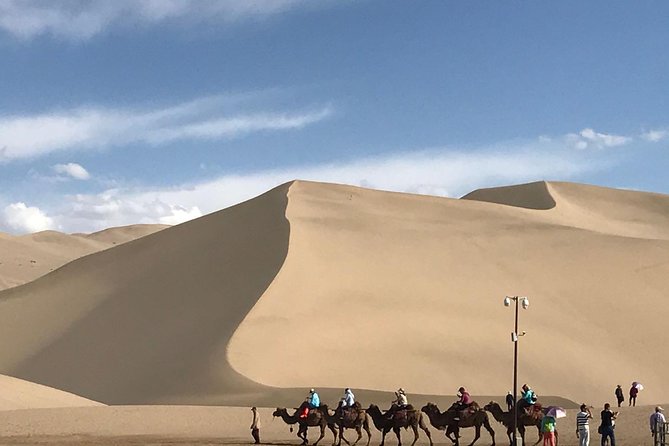 Dunhuang Private Day Tour Mogao Grottoes, Singing Dunes and Crescent Moon Spring - How the Cave Visit Works, Including the 8-Cave Option