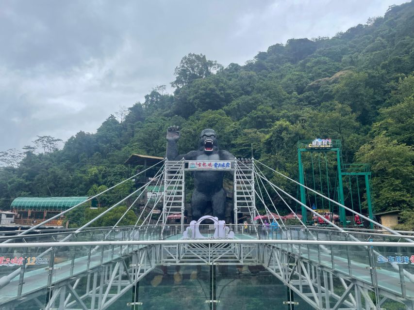 From Guangzhou: Gulong Canyon Private Day Tour - Entering the glass walkway: what 520m feels like