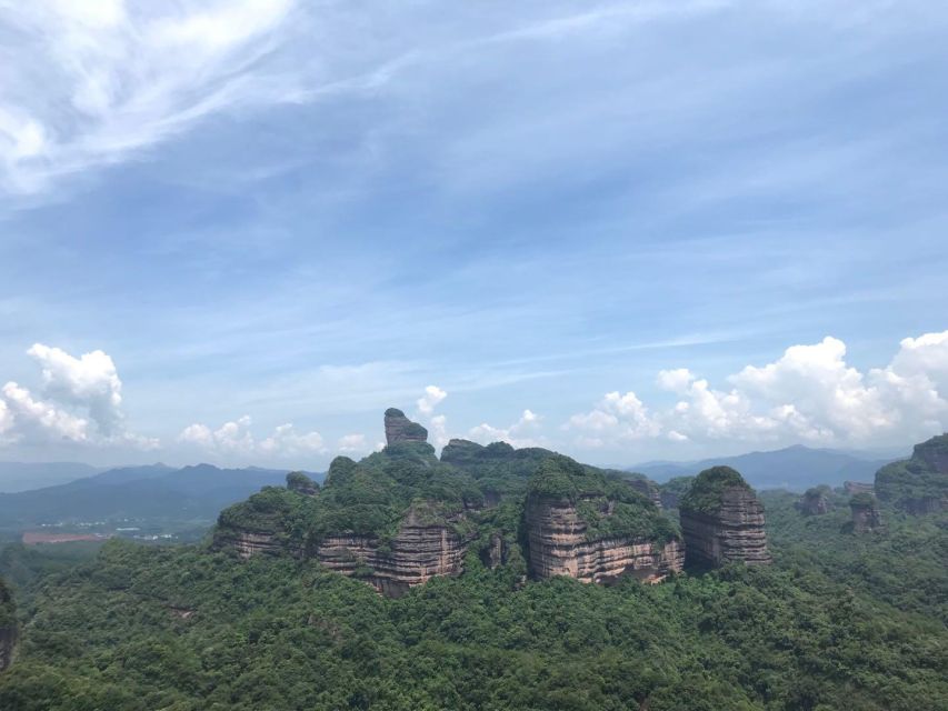 From Guangzhou: Mount Danxia and Nanhua Temple Full-Day - Yang Yuan Stone (Male or Father Stone): The Quirky Stop People Remember