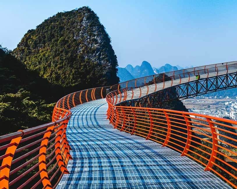 Guilin: Cave, Yulong Rafting, Glass-bottomed skywalk & Show - Reed Flute Cave: Lit Formations Plus 500 Meters of Walking