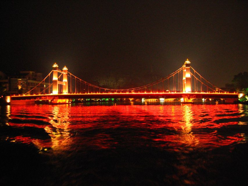 Guilin: Four Lakes Night Cruise with Round-trip Transfer - Hotel Pickup and Transfer: Smooth Logistics, Mixed Language Reality