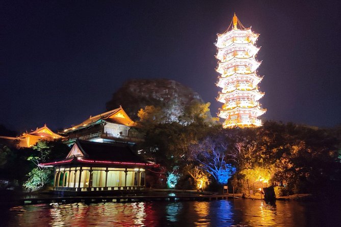Guilin Four lakes night cruise with the English speaking driver from Guilin hotel - Onboard Entertainment: Local Music Performances (and a Few Extras)