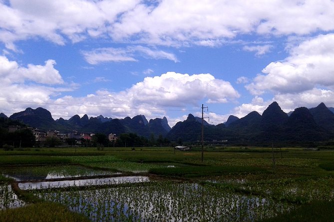 Guilin Highlights Tour Li River to Yangshuo and Xianggong Hill - The Li River cruise: 4 hours of karst views with guide context