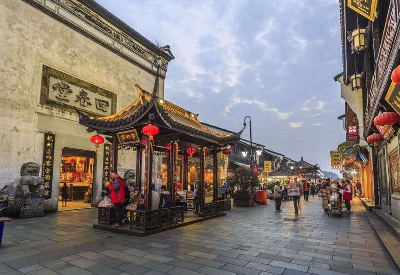 Hangzhou Private One Day Trip from Shanghai by Bullet Train - Hefang Street after sunset: crafts, snacks, and simple souvenir hunting