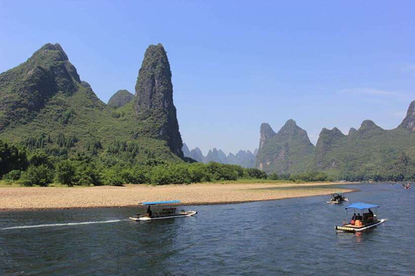 Highlights from Guilin to Yangshuo Full Day Private Tour - Li River bamboo rafting from Fuli Pier: where “fewer boats” actually matters