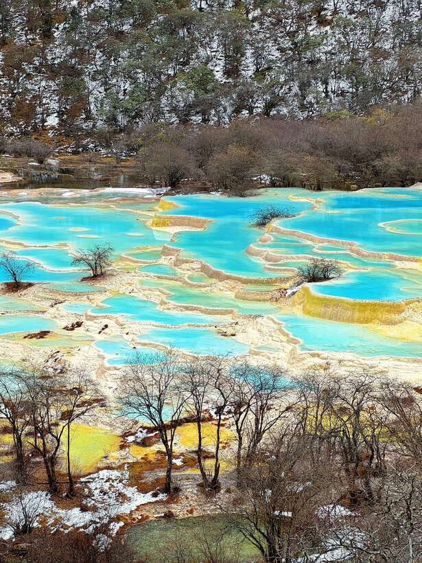 Huanglong Scenic Area: Explore Stunning Five-Colored Ponds - Huanglong in One Day, why the ponds feel like a living staircase