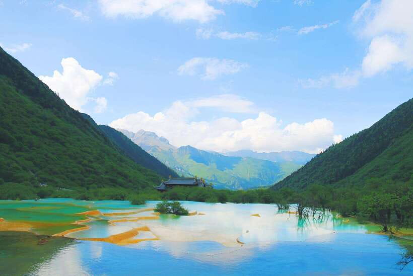 Huanglong Scenic Area: Explore Stunning Five-Colored Ponds - Walking the travertine wonders, Four Wonders plus Golden Sand Pavement