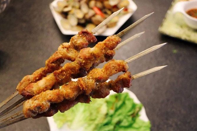 Late Night Food Tour in the Shanghai's French Concession - Stop 1: Xintiandi, First Bites and a Neighborhood You Can Read