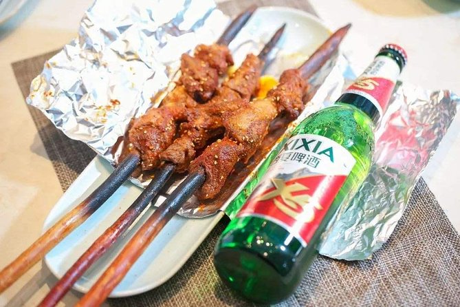 Late Night Food Tour in the Shanghai's French Concession - Stop 3: People’s Square Street Barbecue, Skewers, and Dumpling Finish