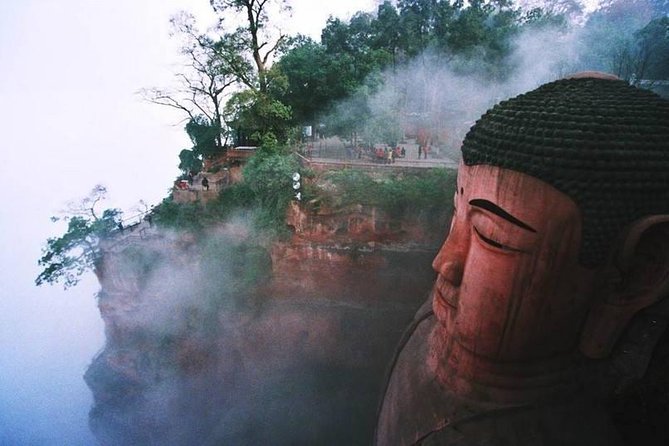 Leshan Giant Buddha and Huanglongxi Ancient Town Day Trip - Stop 1: Leshan Giant Buddha, Maitreya carved into a cliff