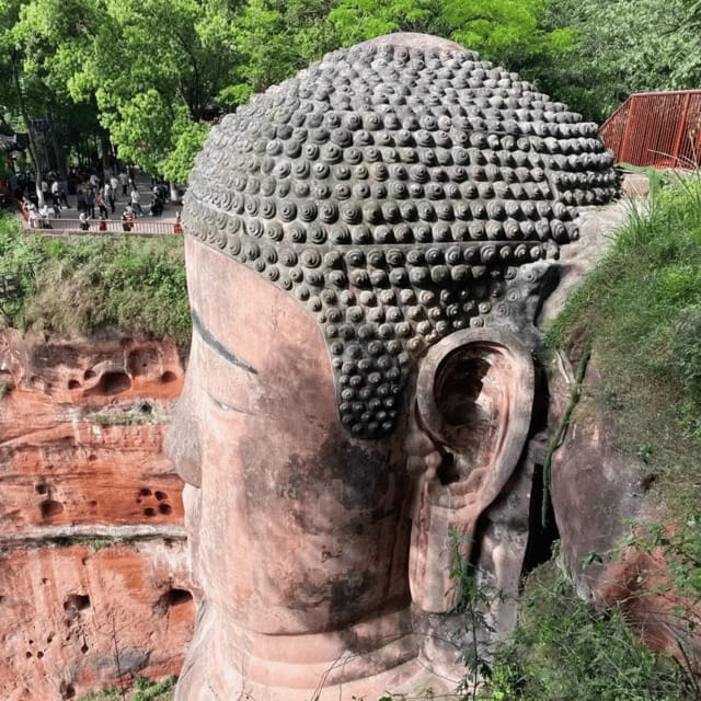 Leshan Giant Buddha Tour: Discover Ancient Stone Masterpiece - Lunch and Qiaojiao Beef During the 1.5-Hour Break