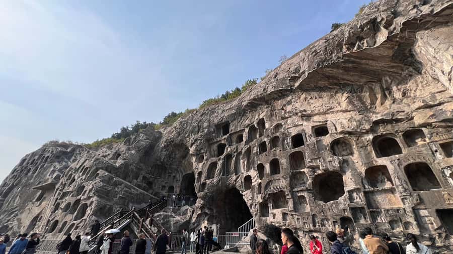 Luoyang: Day tour from Xian or LuoYang with tickets options - Longmen Grottoes: Where the Carving Story Comes Alive