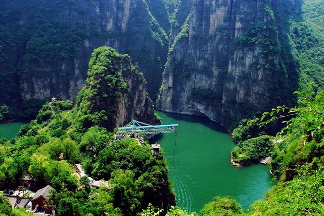 Private Day Tour to Longqing Gorge with Boat Ride and Cable Car from Beijing - Longqing Dam and the dragon-shaped elevator start