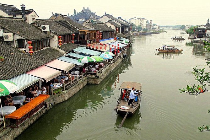 Private Day Tour: Zhujiajiao Water Town with Shanghai Local Shopping Outing - Snack tasting: zong zi, bamboo-wrapped pork, and sweet treats