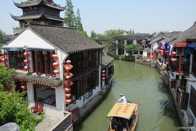 Private Full Day Tour: Zhujiajiao Ancient Water Town with Best of Shanghai - Zhujiajiao’s 36 stone bridges, rivers, and a gondola ride