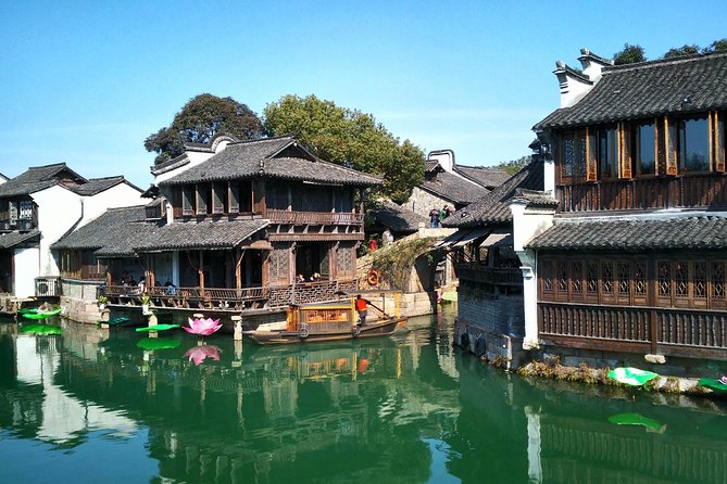 Private Round Transfer to Wuzhen &Xitang Water Town from Shanghai - Wuzhen Water Town: Morning Lanes, Bridges, and Canal Time