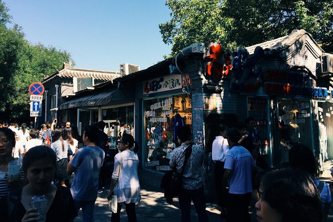 Private Tour: Beijing Hutong Night Walking and snacks Taste - Imperial City Park after dark: locals use the space