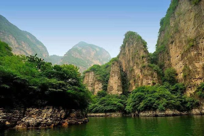 Private Transfer to Longqing Gorge and Guyaju Caves Excursion by English Driver - Guyaju Caves and the 117 stone rooms you can explore at your own pace