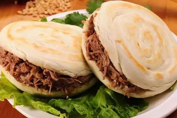 Private Xi'an Foodie Tour by Tuktuk - How the short park walk and bus ride keep you from wasting time