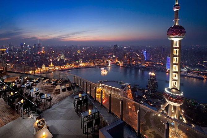 Shanghai Authentic Dinner and Night River Cruise with Rooftop Bar Hopping Option - Stop 2: The Huangpu River cruise with skyline icons lit up