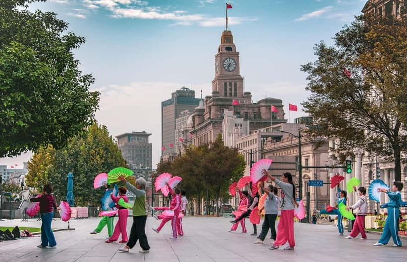 Shanghai Highlights Walking Tour With A Real Local - Nanjing Road Pedestrian Street, lane houses, and the Peace Hotel