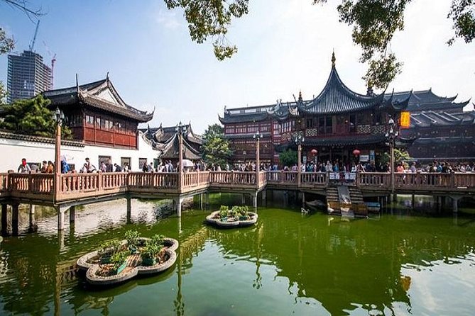 Shanghai in a Day: A Whirlwind Tour of the City's Highlights - The Bund riverfront stroll and the Pudong skyline contrast