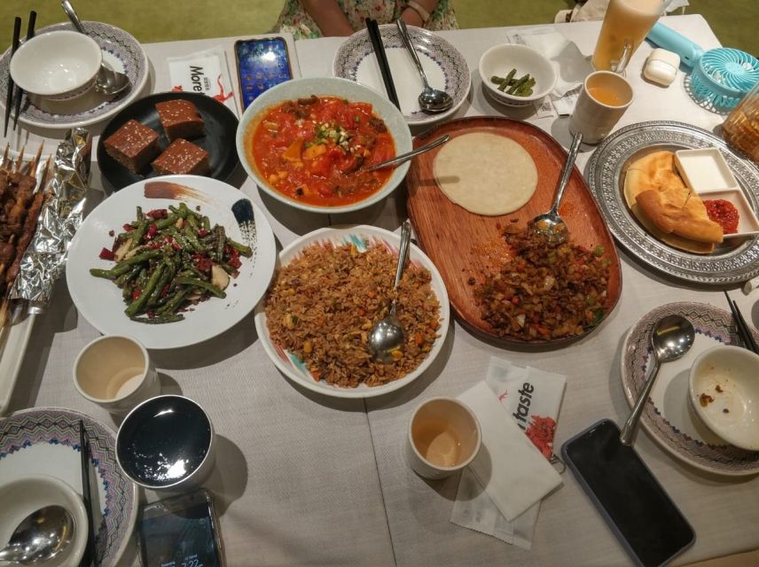Shanghai: Night River Cruise Tour with Xinjiang Style Dining - What to Expect at Each Step of the Evening