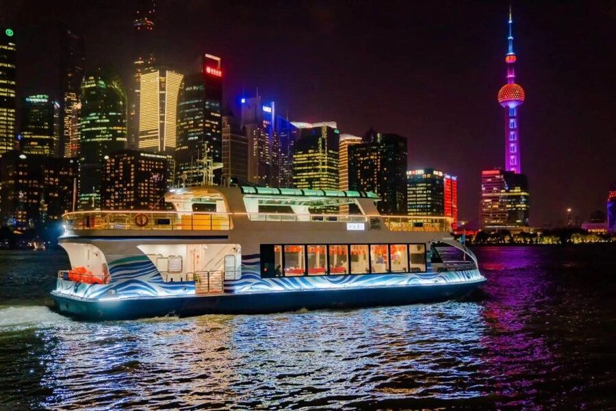 Shanghai: Night River Cruise Tour with Xinjiang Style Dining - Huangpu River After Dark: Bund Classics and Pudong Icons From the Water