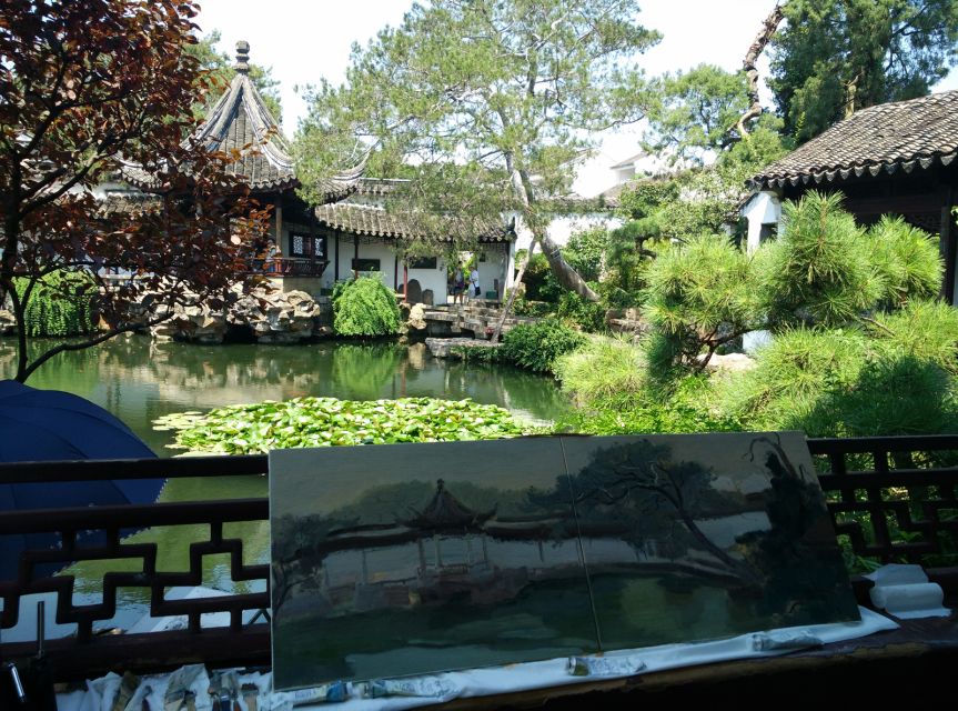 Su Zhou and Zhou Zhuang Water Village Day Tour - The ancient city wall and Grand Canal edges in Suzhou