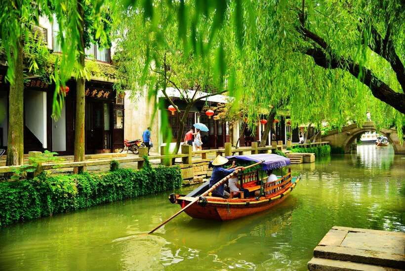 Suzhou and Zhujiajiao Private Guided Day Trip from Shanghai - Zhujiajiao water town: stone alleys, crafts, and everyday canal life