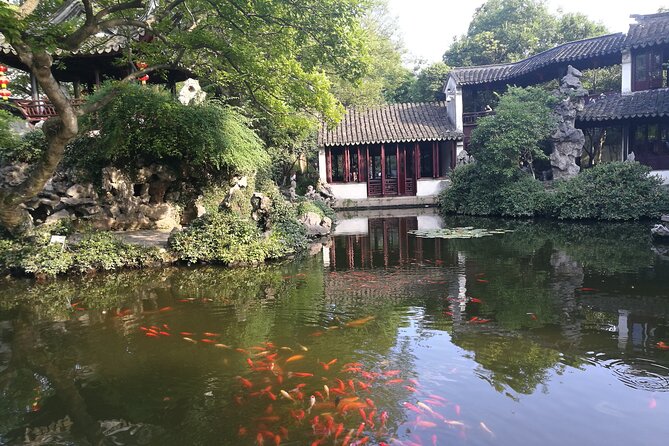 Tongli Water Town Private Day Trip from Shanghai with Tuisi Garden and Boat Ride - The canal boat ride: a calm break from walking and crowds