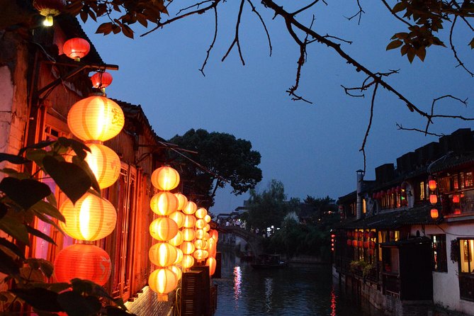 Xitang Water Village Sunset Tour with Riverside Dining Experience from Shanghai - Jinze Water Village first: a quieter water-town warm-up