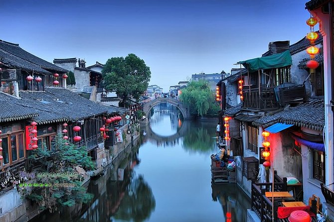 Xitang Water Village Sunset Tour with Riverside Dining Experience from Shanghai - Boat to beer to bars: what the evening stroll can include