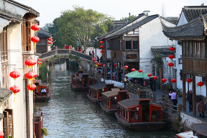 Zhujiajiao Private Day Tour and Shanghai Acrobatic Show - Key highlights at a glance